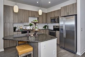Enclave at Cherry Creek - Granite countertops and kitchen islands
